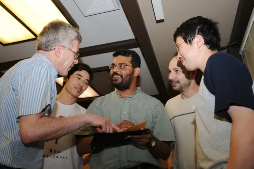 Members of the Walter Leal lab congratulate Zain Syed on his award. From left are Walter Leal, professor of entomology; Zhao Liu, graduate student; Zain Syed; Julien Pelletier, postdoctoral scholar; and Wei Xu, ag chemistry graduate student. (Photo by Kathy Keatley Garvey)
