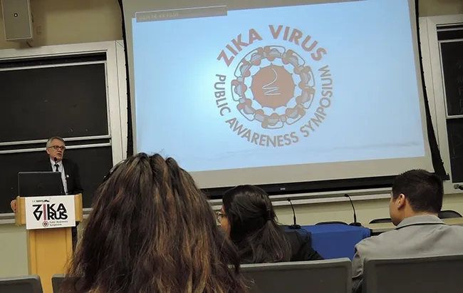 Chemical ecologist Walter Leal, coordinator of the Zika Public Awareness Symposium, addresses the crowd. (Photo by Kathy Keatley Garvey)