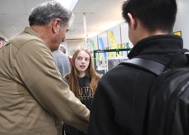 UC Davis entomology student Gwen Erdosh chats with Bohart associate Greg Kareofelas (left) and Christopher Jason, new UC Davis graduate in environmental science. (Photo by Kathy Keatley Garvey)