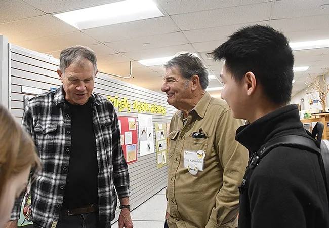 Rosser Garrison (left) retired from the California Department of Food and Agriculture and co-author of a dragonfly book, talks dragonflies with Greg Kareofelas (center) and Christopher Jason. (Photo by Kathy Keatley Garvey)