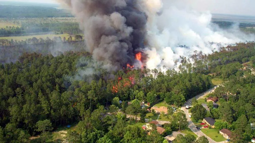 One of the risks of living in WUI areas is the increased likelihood of wildfire. Photo: Snappygoat.com