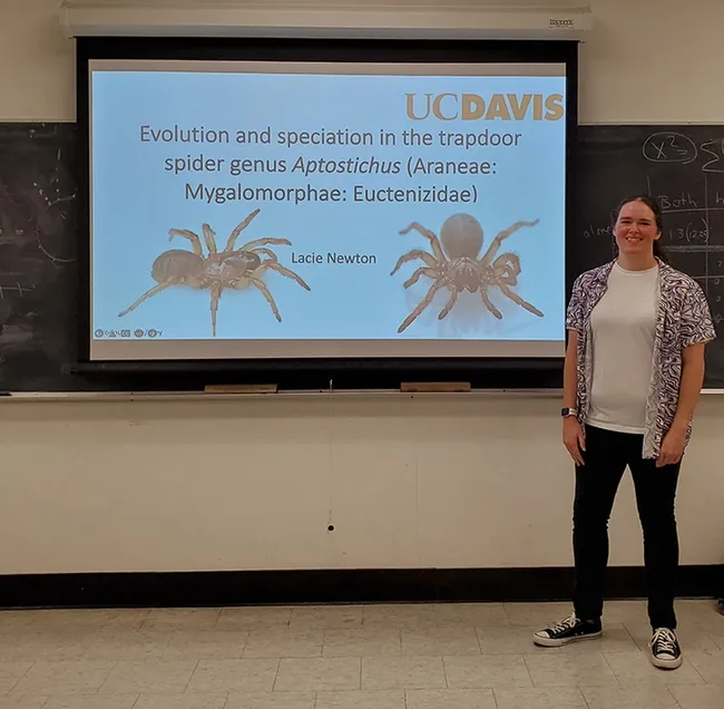 UC Davis doctoral candidate and arachnologist Lacie Newton delivering her exit seminar. She will be participating in the American Arachnological Society conference at UC Davis. An open house at the Bohart Museum on June 25 will kick off the conference.