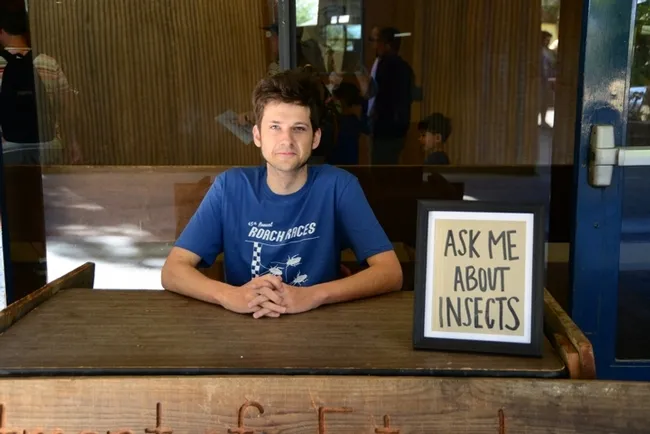 Zachary "Zach" Griebenow, a doctoral candidate in the Phil Ward lab, is ready to answer your questions about insects. (Photo by Kathy Keatley Garvey)