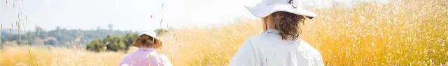 Workers in a wheat field.