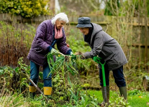 Two women working in a garden