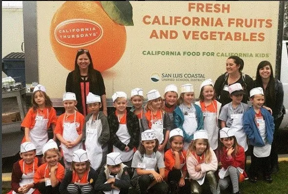 Delivery truck wrapped in healthy food marketing. Photo: @slcusdfood