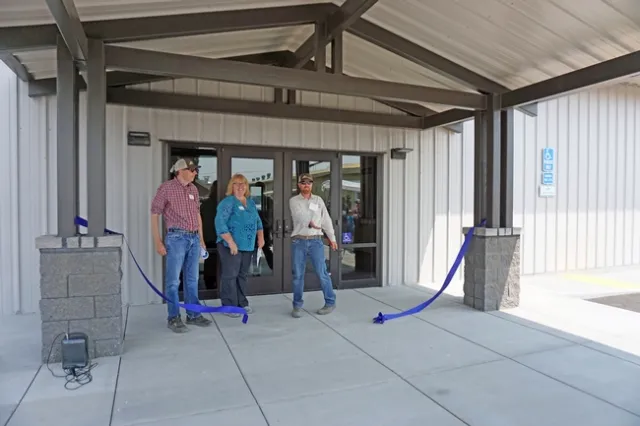 UC ANR vice provost Mark Lagrimini (left), associate vice president Wendy Powers, and IREC director Rob Wilson too part in the ribbon cutting ceremony for the new IREC Multi-purpose Conference and Laboratory Building.