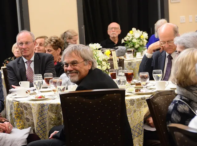 Honey bee geneticist Robert E. Page Jr., (foreground) smiles at the introduction. (Photo by Kathy Keatley Garvey)