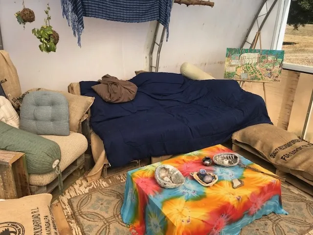 A communal space located inside their recently built greenhouse