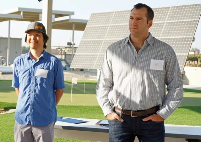 Thomas Kuo of PowWow Energy and and Justin Roeloffs of Roeloffs Solutions speak at Open Farm 2019.