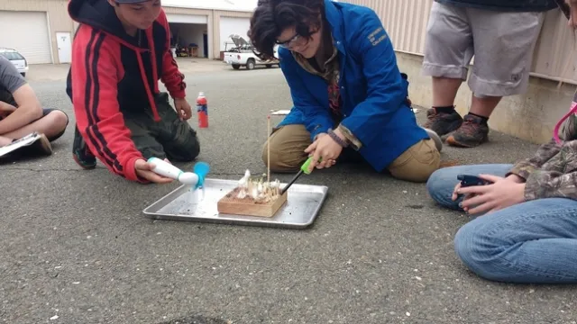 Students from the Say Yuba Environmental Science (YES) Charter Academy model wildfire in oak woodlands.