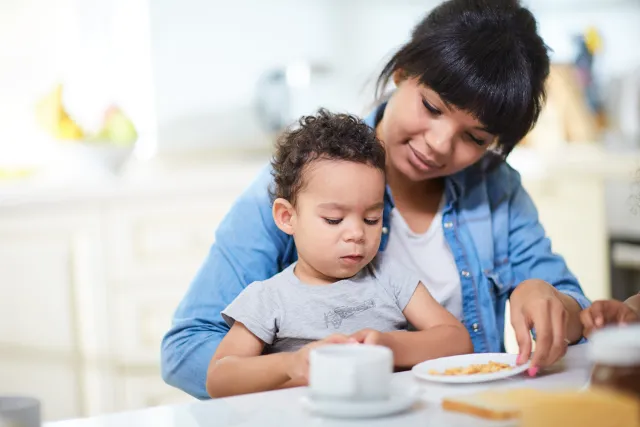 Mother and child eating