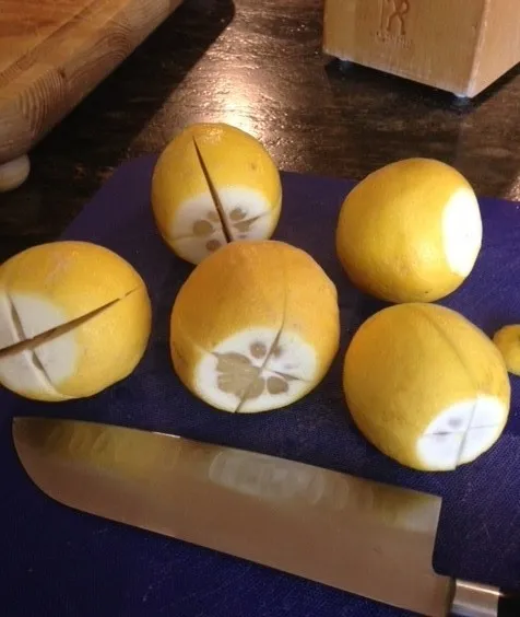 Whole lemons cut into a