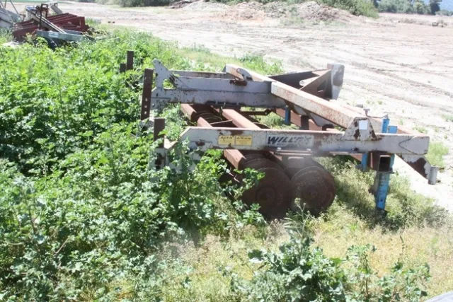 This equipment yard was had a good deal of malva.