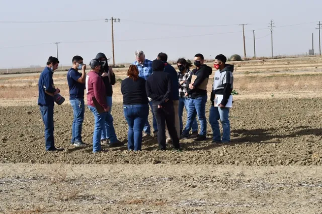 Photo 1. Fresno State University agronomy students tour the 22-year conservation agriculture systems comparison field at the UC West Side Research and Extension Center in Five Points, CA on October 11, 2021. The group was hosted by Dan Munk, Joy Hollingsworth, and Jeff Mitchell.