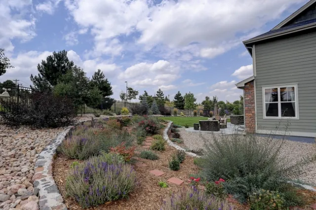 There are several easy strategies to help prepare your home landscape for wildfire. Pictured here you see gravel hardscape, a non-combustible material, within the first five feet of a home. Source: www.readyforwildfire.org.