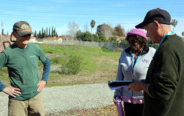 Jack Cortis and Allison Thomas speak with MG David George- Courtesy Hedwig van den Broeck