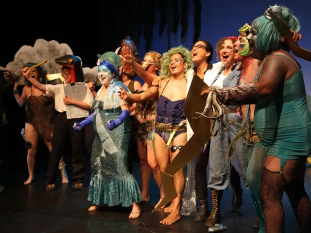 Woelfle Hazard (second from right) performs as a water nymph in