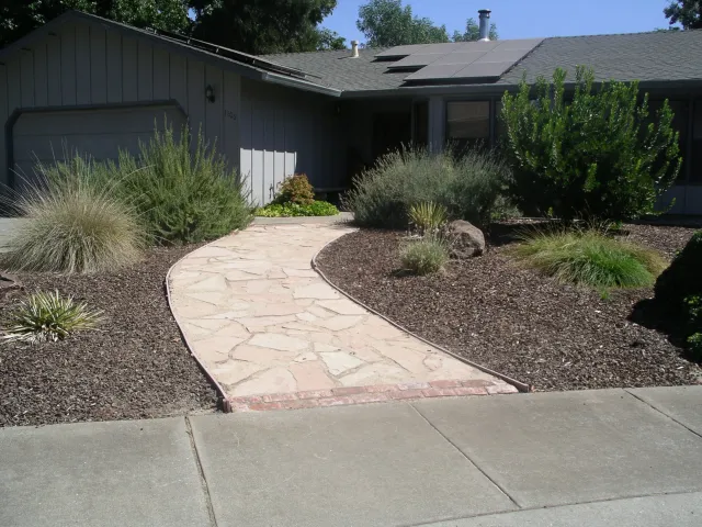 Curb appeal. Flagstone walkway to door. Cindy Weiner