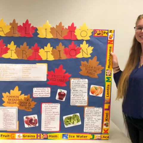 Stephanie with her "Fall Into Nutrition" corner