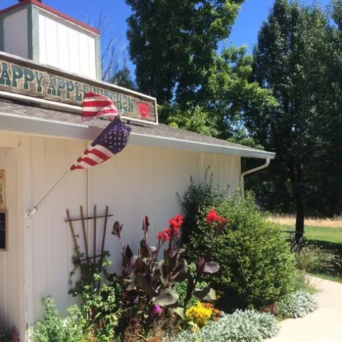 A view of the front of Happy Apple Kitchen, a small family owned restaurant.