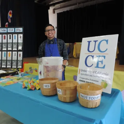 Nutrition Educator standing at table