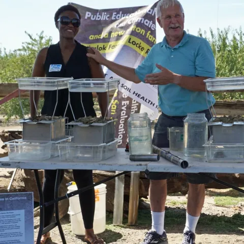 UCCE climate-smart educator Esther Mosase, left, and UCCE specialist Jeff Mitchell at a field day.