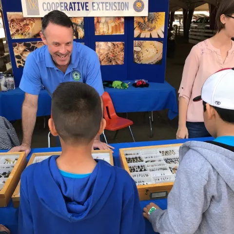 David Haviland teaching young children about entomology.
