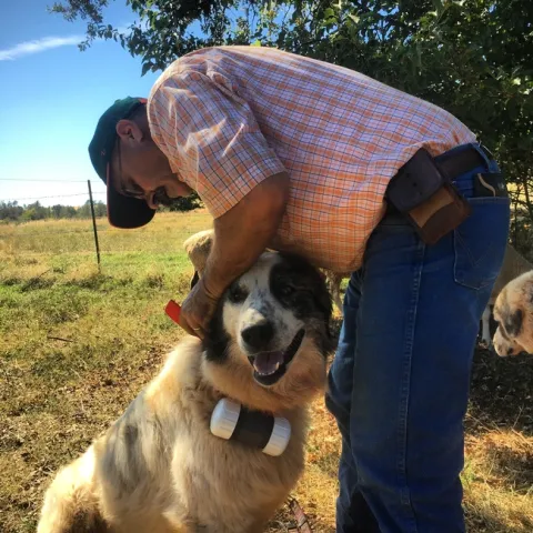 Macon with guardian dog Bodie. (Photo: Hannah Meyer)