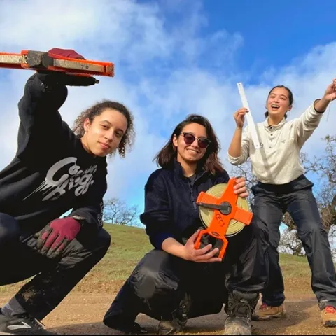Bita Rostami (center) with fellow researchers, Logan Ruggles and Marissa Lopez, at the Blue Oak Ranch Reserve in San Jose. This project was part of the California Ecology and Conservation, UC Natural Reserve System. They were measuring the abundance of yarrow, Achillea millefolium, in burned out areas and unburned areas of the reserve. (Photo by Logan Ruggles)