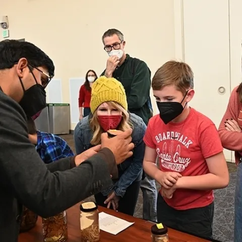 Nematologist Shahid Siddique, assistant professor, UC Davis Department of Entomology and Nematology, interacts with visitors at the 2021 UC Davis Biodiversity Day. (Photo by Kathy Keatley Garvey)