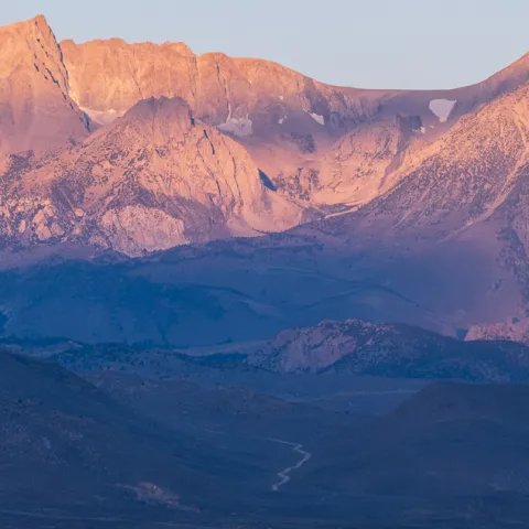 Tall mountains at sunrise.