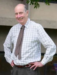 Bruce Hammock, the professor, in front of Briggs Hall. (Photo by Kathy Keatley Garvey)