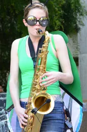 Tenor saxophonist Jill Oberski dressed as a