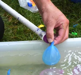 Some 2000 water balloons will be filled. (Photo by Kathy Keatley Garvey)