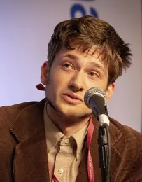 Doctoral student Zachary Griebenow answers a question at the 2018 Linnaean Games' championship round. (ESA Photo)
