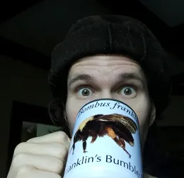 Inaugural winner Charlie Casey Nicholson, with his prize-winning coffee cup