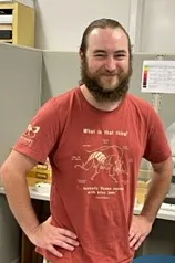 Entomologist Brennen Dyer, lab assistant at the Bohart, likes his new