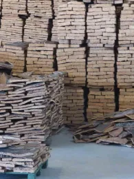 Cork sorted into piles in Alentejo, Portugal cork factory. J.C. Lawrence