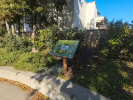 Garden with butterfly sign