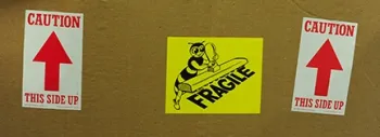 This side up! One of the many boxes that fill the office of Eric Mussen, WAS President. (Photo by Kathy Keatley Garvey)