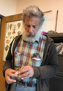 Art Shapiro, UC Davis distinguished professor of evolution and ecology, holds the first butterfly of the year. He collected it in West Sacramento on Jan. 19. (Photo by Sherri Mann of the Department of Evolution and Ecology)