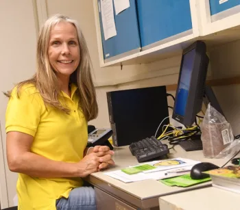 Wendy Mather at her computer at the Harry H. Laidlaw Jr. Honey Bee Research Facility. (Photo by Kathy Keatley Garvey)