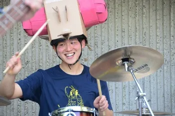 Molecular geneticist Yao Cao as a drummer in the Entomology Band that performed at the 2018 UC Davis Picnic Day. (Photo by Kathy Keatley Garvey)