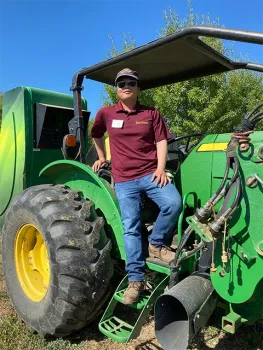 Doctoral student Tong Zhen is studying the effectiveness and soil impacts of this electrical weed control device, made by the Brazilian company Zasso, He's working with Brad Hanson, professor of UC Cooperative Extension, both in the UC Davis Department of Plant Sciences. (Trina Kleist/UC Davis)