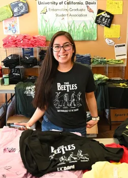 Doctoral candidate Mia Lippey, president of the UC Davis Entomology Graduate Student Association, shows the popular