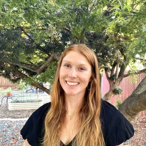 Lauren Fordyce standing outside under a tree. 
